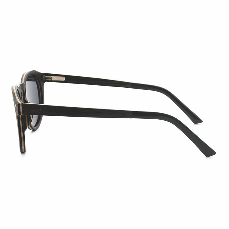 Conspek Sunglasses with grey lenses, wooden frame and acetate tip arms by Spek Eyewear.
