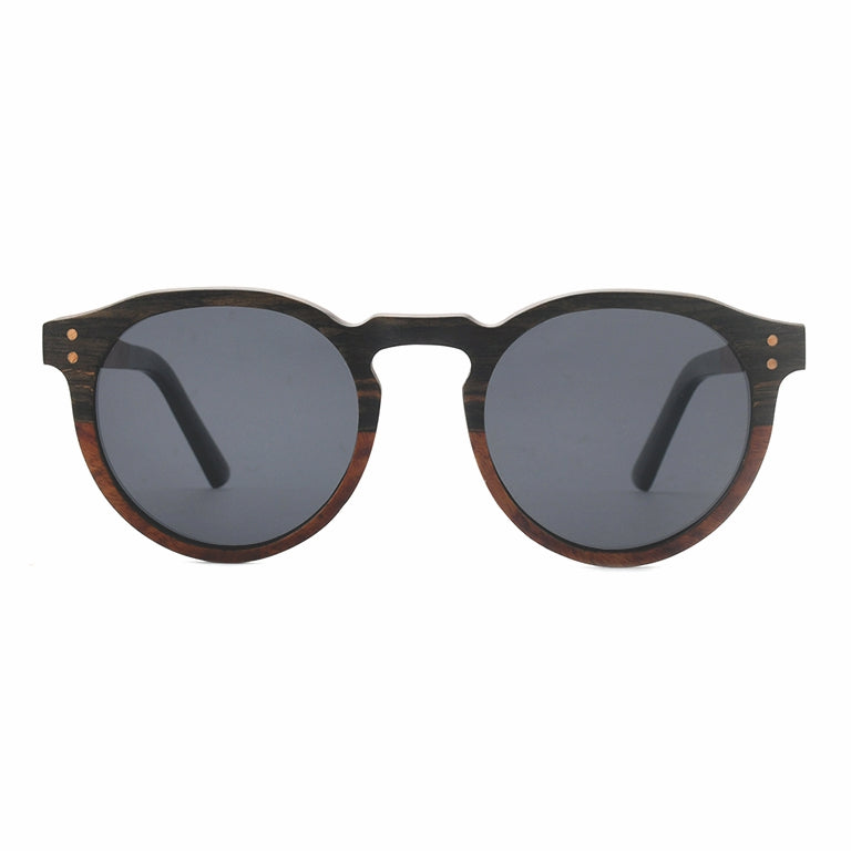 Conspek Sunglasses with grey lenses, wooden two-tone frame and acetate tip arms by Spek Eyewear.