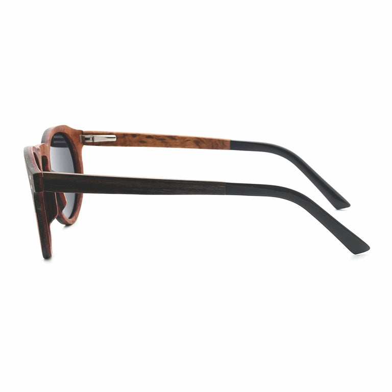 Conspek Sunglasses with grey lenses, wooden two-tone frame and acetate tip arms by Spek Eyewear.