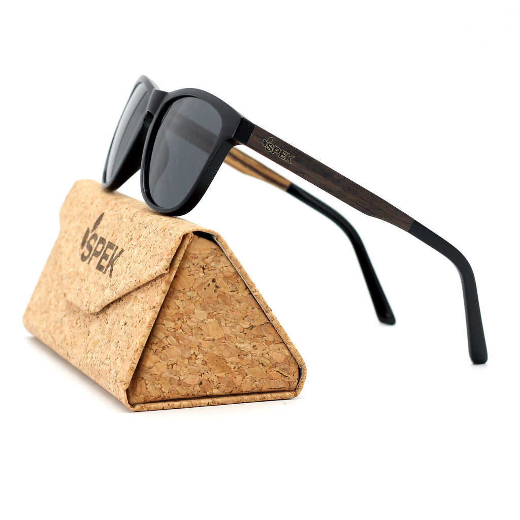 Spektura Sunglasses with grey lenses, black frame and wooden arms by Spek Eyewear.