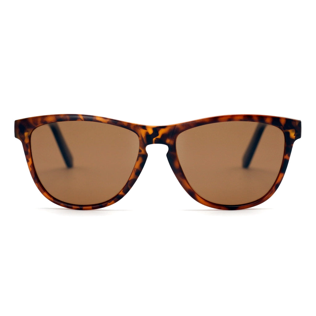 Spektura Sunglasses with brown lenses, tortoise shell frame and wooden arms by Spek Eyewear.